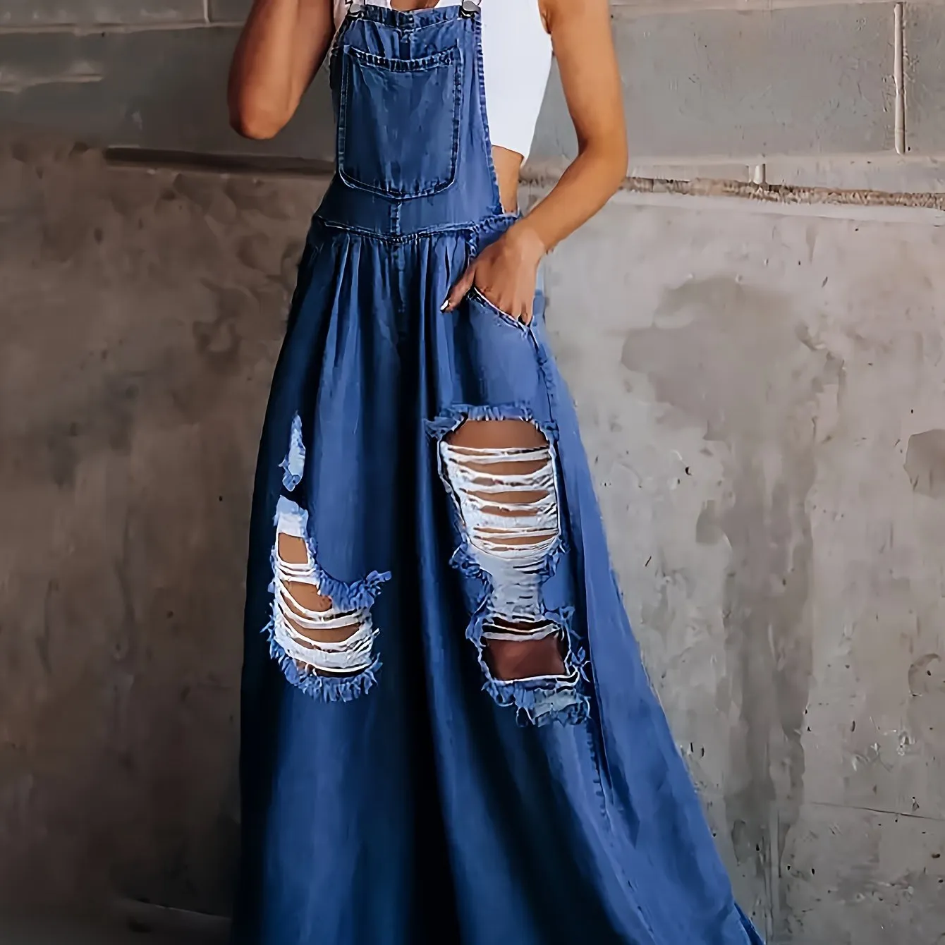 Womens Ripped Denim Jumpsuit - Fashionable Ripped Detail, Loose Fit for Comfort, Trendy Distressed Overall with Stylish Slant Pockets - Casual Everyday Denim Wear